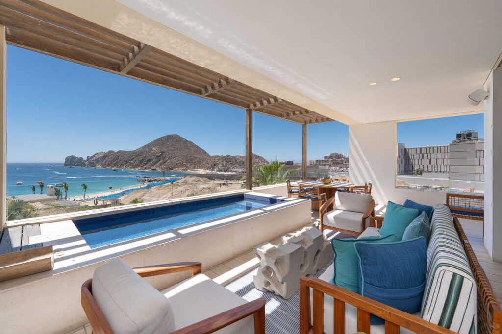 Los Cabos Amaterra 2BR/2BA oceanside condo in prime Cabo San Lucas location, less than a 5-minute walk to the beach. Bright, open-concept living and dining area with abundant natural light and access to private terrace. Modern kitchen with ample cabinetry and workspace. Spacious primary suite with en-suite bath; well-sized second bedroom with adjacent full bath. Ideal for vacation home, rental investment, or full-time residence. Close to beaches, restaurants, shopping, and downtown Cabo amenities. Condo unit comes with 2 underground parking stalls as well. – 1 Homes Cabo, Cabo San Lucas, Cabo San Lucas, BS