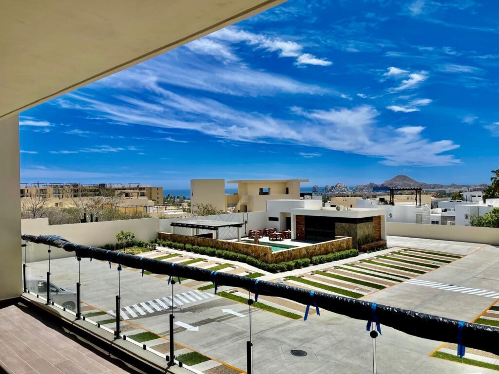Los Cabos Brisas Del Tezal Ready for delivery! Brisas del Tezal second-floor condo featuring 2 bedrooms and 2 bathrooms in an exclusive low-density community of 36 units across two 4-story elevator buildings. Located minutes from Medano Beach and downtown Cabo. Showcases excellent construction quality and craftsmanship from the developer, including parota wood carpentry and a large, solid front door. Features large-format tile flooring throughout, spacious balcony, granite countertops and backsplash in the kitchen, bathrooms with marble showers to the ceiling, wall-to-wall closets, and a laundry room with space for side-by-side washer and dryer, plus manual washing area and storage. Equipped with 1-ton A/C mini-splits in each bedroom and two in the living area.Enjoy ocean, city, mountain, and sunset – 2nd floor Ocean view, Cabo Corridor, BS