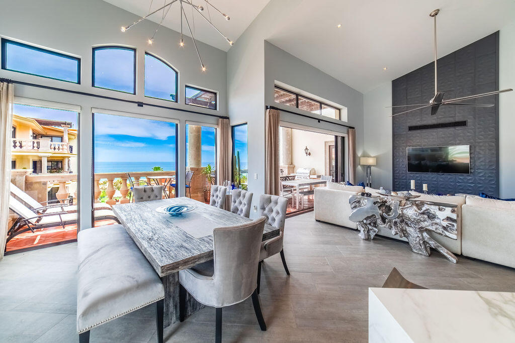 Los Cabos Puerta Del Sol-Cdsol Perched to capture sweeping ocean vistas, undoubtably THE MOST ATTRACTIVE & fully updated and remodeled 3-bedroom condo offers a rare blend of luxury, comfort, and elevated design. Vaulted ceilings create a dramatic sense of space and light, while the open-concept layout seamlessly connects the expansive living and dining areas to a generous outdoor terrace--perfect for entertaining or simply soaking in the endless blue horizon.Thoughtfully redesigned, the residence features upgraded finishes throughout, including modernized kitchen and baths, enhanced air conditioning, and high-quality doors and windows built for both style and durability. Each bedroom is well-proportioned, with the primary suite offering a private retreat complete with serene for sale