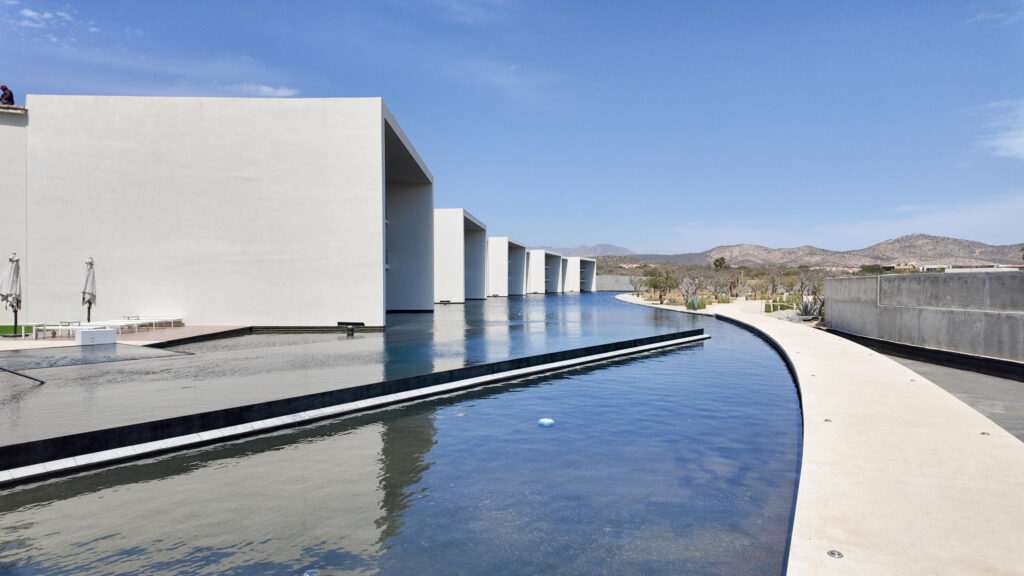 Los Cabos Cumbre Del Tezal Discover Yameto in Cabo San Lucas, a condominium that blends modern design, functionality, and comfort in every space. Featuring two bedrooms, two full bathrooms, and parking for two vehicles, it stands out for its high-quality finishes such as marble flooring and a fully equipped kitchen with a quartz countertop. It is delivered fully equipped with included appliances: a 5-burner electric ceramic cooktop, a three-door French Door refrigerator, and a microwave hood, giving you convenience and savings from day one. Additional features like a smart lock and a private terrace.Yameto elevates your lifestyle with amenities designed for maximum enjoyment: a swimming pool, gym, green areas, children's spaces, and a rooftop for gathering or relaxing. With 24/7 security and controlled access. – Cora Sunset C, San Jose del Cabo, San Jose del Cabo, BS
