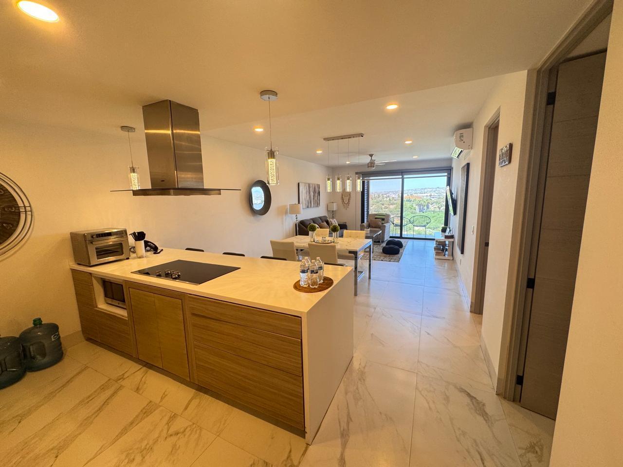 Los Cabos Amaterra Discover elevated living at Amaterra 602A, a stylish turnkey penthouse in the heart of the Cabo San Lucas corridor. Located just a 5-minute walk from the beach, this fully furnished 2-bedroom, 2-bath residence offers comfort, convenience, and excellent Airbnb potential. Positioned on the 6th floor, the condo features modern finishes, mini-split A/C, ceiling fans, and a bright open layout with city for sale