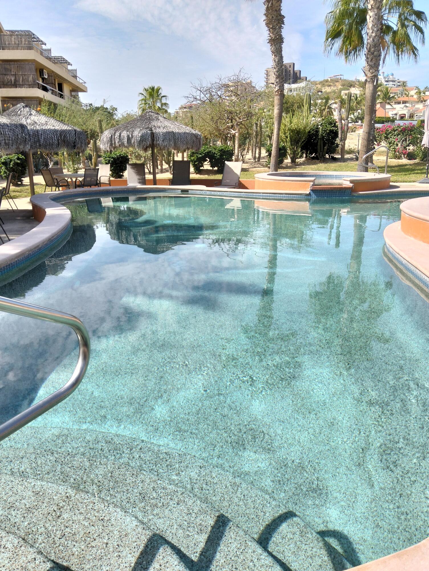 Los Cabos Club La Costa End unit 1 bedroom/1 bath unit in great condition in a fully gated community on the Vidanta Golf Course.. Ground level for easy access with large 13' X 18' deck. unit location has both front and side gardens offering more privacy. Has many additional built-ins, has never been a rental and features exclusive assigned parking space out front of the building. F2 offers 3 swimming pools plus hot tubs. Shops, restaurants, beach and public transportation are just a minutes walk away. Comes partially furnished and ready for your personal touches. for sale