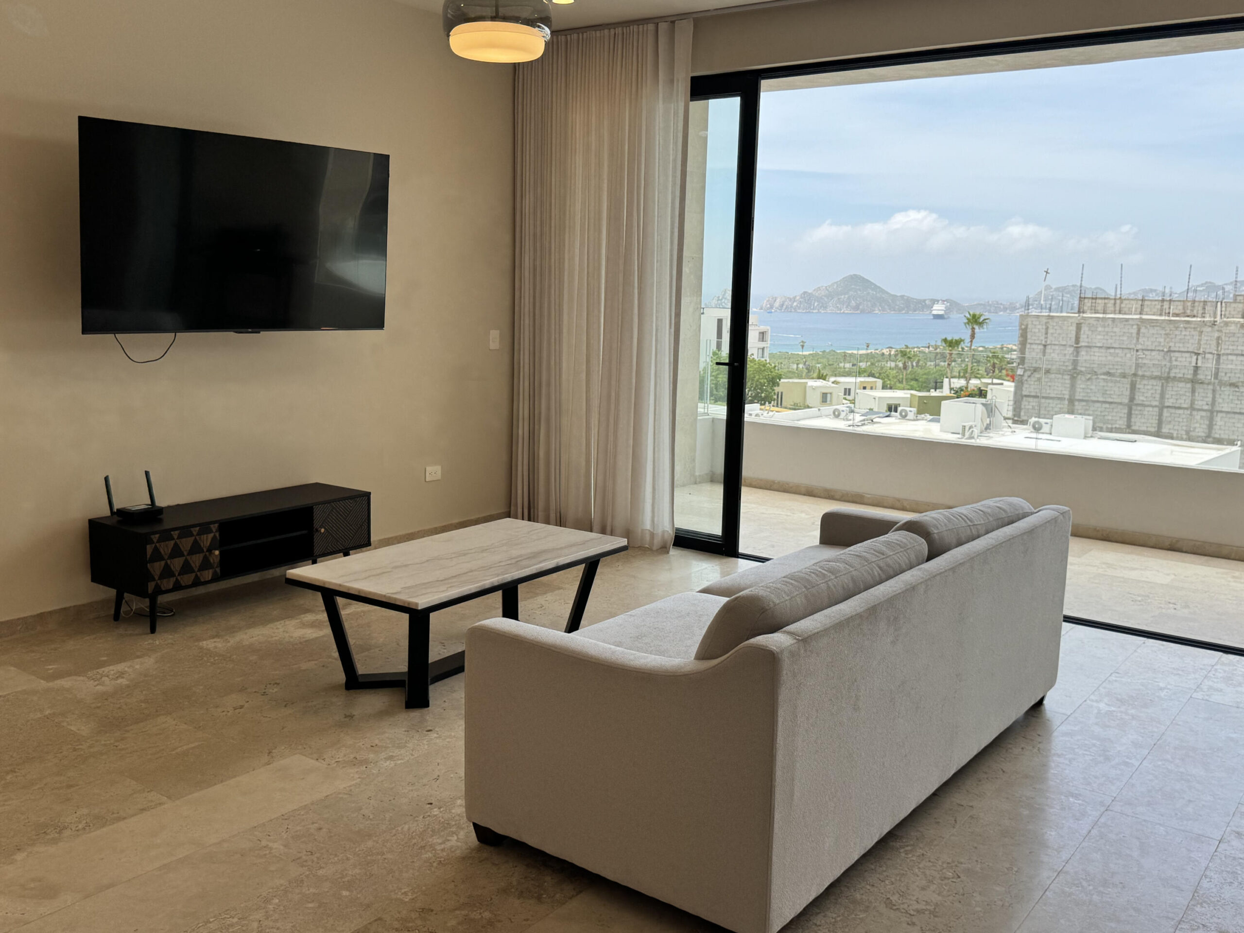 Los Cabos Vistas Del Tezal Modern 2-bedroom, 2-bathroom condo located in the gated community of Vistas del Tezal, one of the most sought-after areas in Cabo San Lucas. This turnkey unit offers comfortable living spaces, quality finishes, quartz countertops and a private terrace with incredible for sale