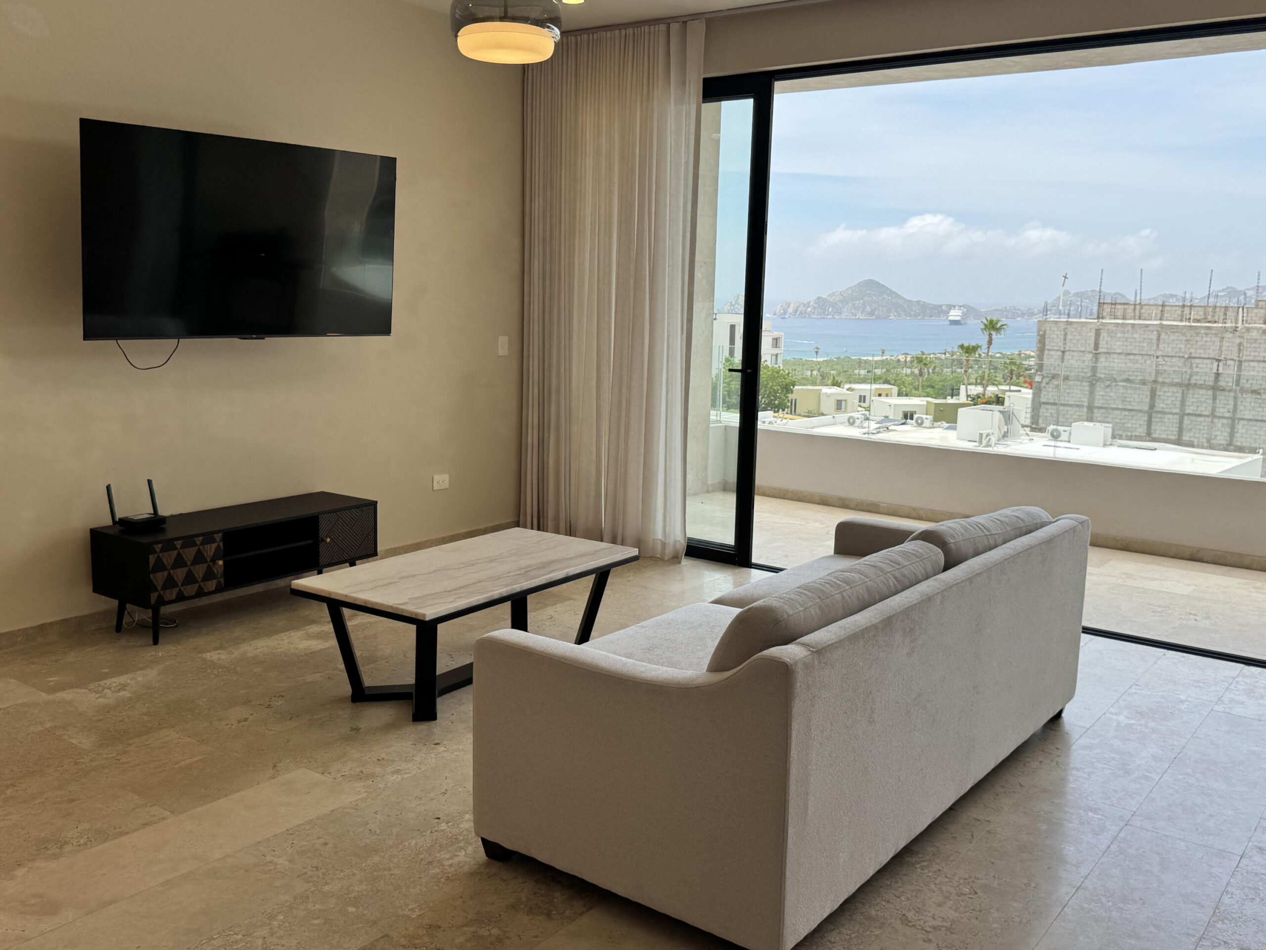 Los Cabos Vistas Del Tezal Modern 2-bedroom, 2-bathroom condo located in the gated community of Vistas del Tezal, one of the most sought-after areas in Cabo San Lucas. This turnkey unit offers comfortable living spaces, quality finishes, quartz countertops and a private terrace with incredible for sale