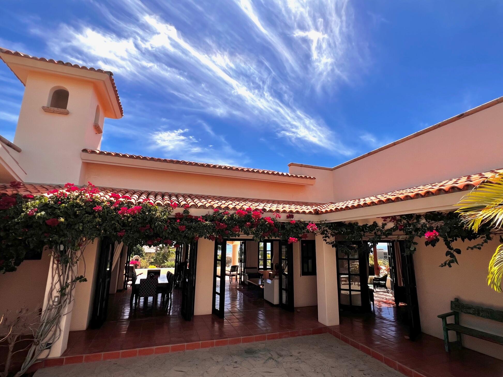 Los Cabos La Noria One of the first homes built in La Noria, within the amenity rich development of Puerto Los Cabos, this very unique two bedroom, two bath home, followed the Hacienda style's original design guidelines, with a large entry courtyard, rooms to the sides and opening to the main living area, kitchen and outdoor patio/deck.The initial concept and plans were designed with a third bedroom in mind, to be built at a different time, yet the functionality of the two bedroom house ended up suiting its owners well and thus house did not grow within the still remaining buildable area of the homesite.Subsequently, a second design concept was planned, to build a second level master bedroom with panoramic for sale