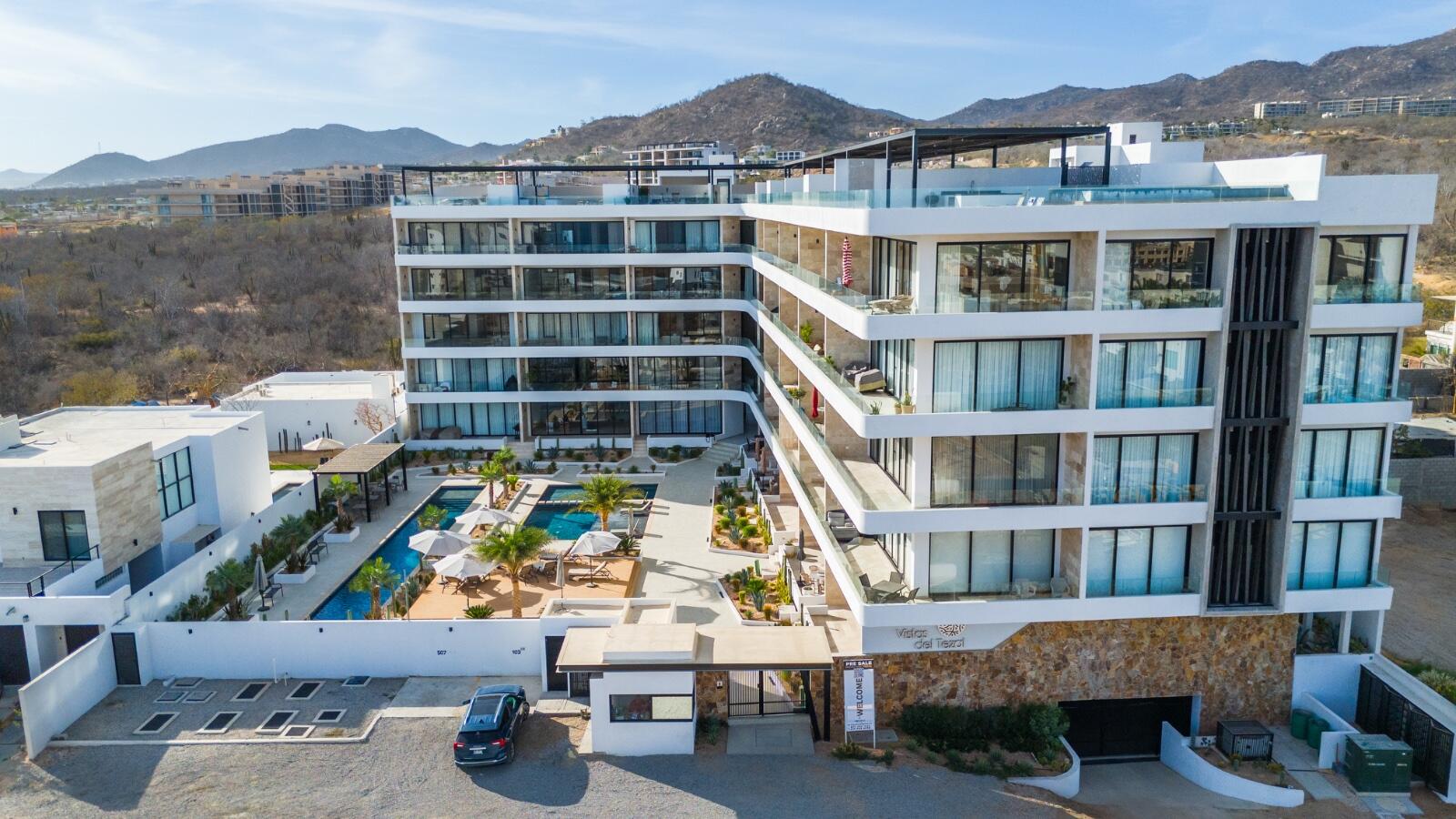Los Cabos Dunna Welcome to Dunna - A New Standard of Luxury in Cabo. More than a residence, Dunna is a vibrant, fully integrated community where luxury, culture, and recreation converge. Designed by renowned architects Sordo Madaleno, this visionary development seamlessly blends timeless elegance with natural tranquility, offering meticulously crafted residences and garden villas complemented by world-class amenities. Elevated Living, Unmatched Experiences Choose from 13 thoughtfully designed floor plans from 2 - 5 bedrooms ranging from 1,475 - 6,458 sq. ft., featuring seamless indoor-outdoor living, elegant finishes, private rooftops, jacuzzis, and lush garden terraces. Resort-Style AmenitiesEnjoy unparalleled amenities, including:" Infinity pools (Adults-only, Family, Kids & Oasis)" State-of-the-art wellness & fitness center" Luxury spa (sauna, steam, ice baths, massage suites)" Exclusive rooftop lounges & panoramic – Tramonti Paradiso LOWEST PRICE, Cabo Corridor, Cabo Corridor, BS